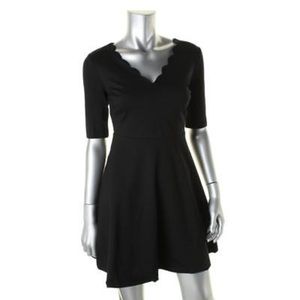 Scalloped black dress